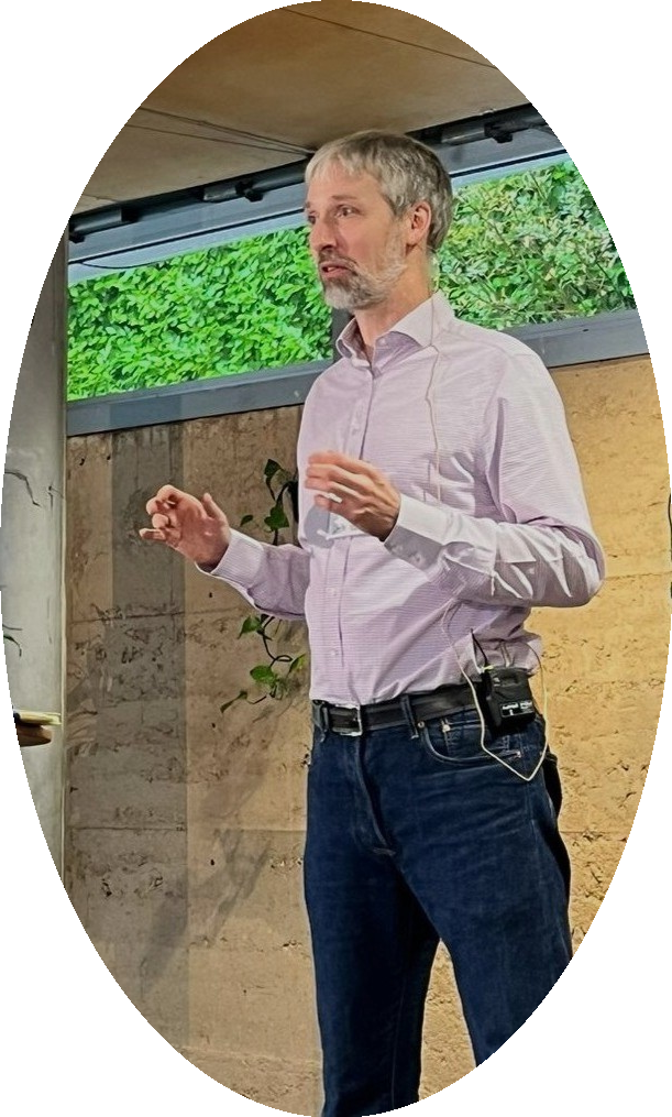 Rufus Curnow speaking at an event